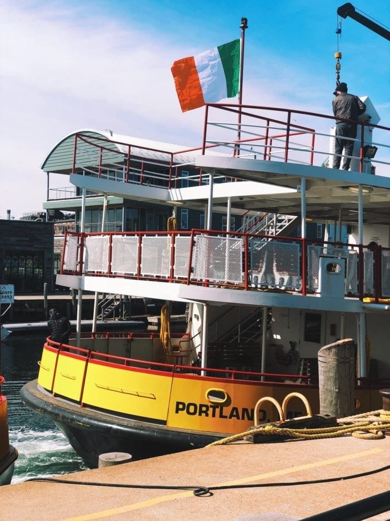 The Irish flag flying on the back of a Casco Bay Lines boat